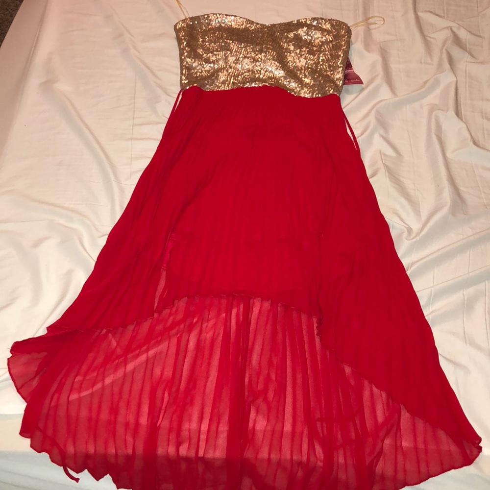 Red and gold strapless high low dress